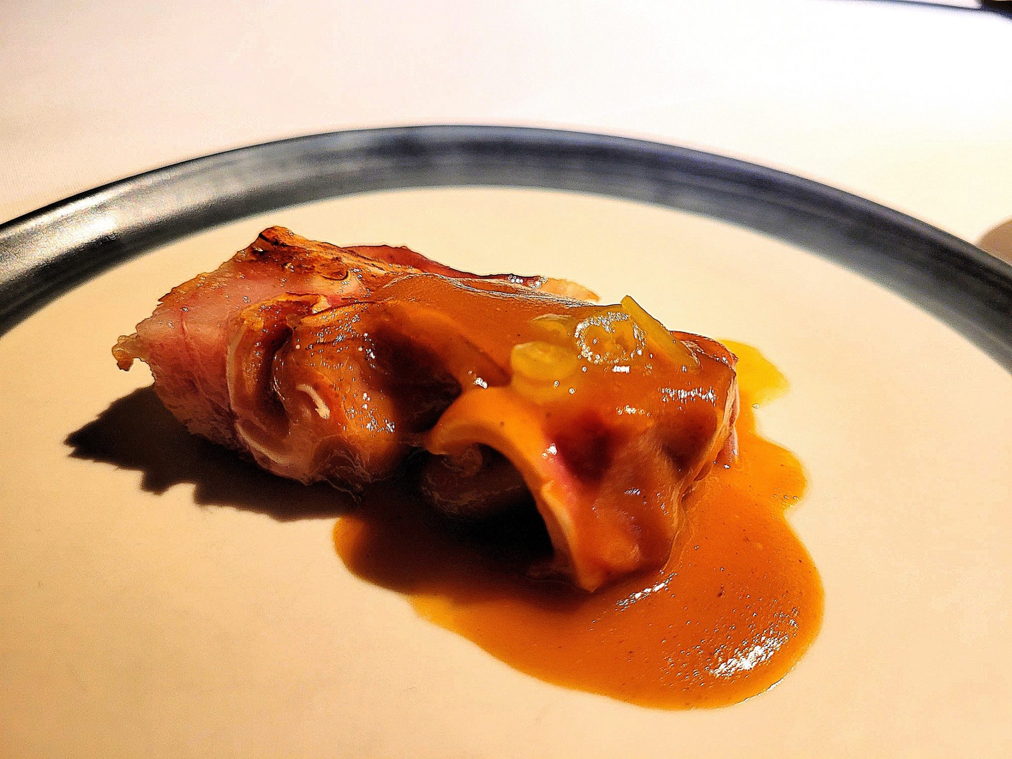 Oreja en salsa brava